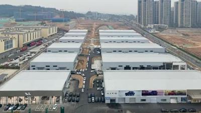 恒信汽车博览中心二期AB两区同步作业 预计有20家新能源汽车品牌和13家配套产业入驻 年销售额将达100亿元以上