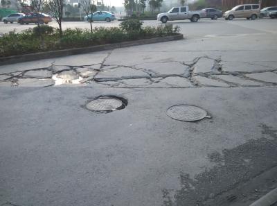 破损道路该由谁来修缮？