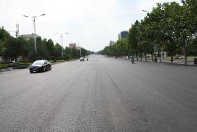 “横”在青龙路的大坑修复了