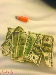 黑纸“洗洗”能变美元？ “老外”网友连环下套骗425万