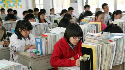 人民日报评“给学生减负”：杜绝减课时不减考试