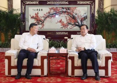 王忠林与中信集团总经理张文武座谈