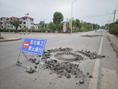 【报道追踪】马四路91个问题井盖已更换