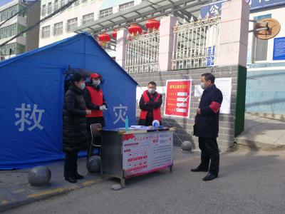 钟祥市机关事务中心机关干部下沉一线防疫情