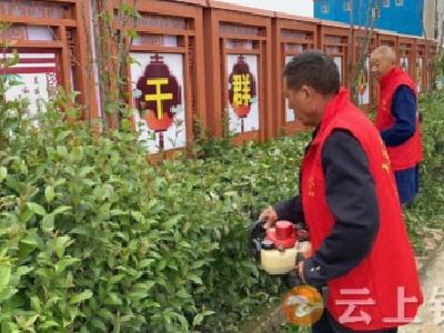 石牌镇关庙村：美化道路环境 共建美丽乡村