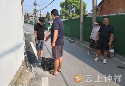 窨井“张嘴”隐患大 网格员及时协调解民忧