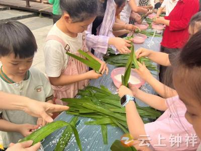 粽叶包裹邻里情 巧手剪出端午韵
