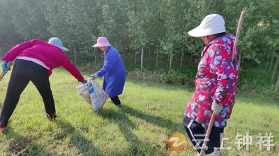 洋梓镇开展“五一”节前全民大扫除 以洁净面貌迎佳节