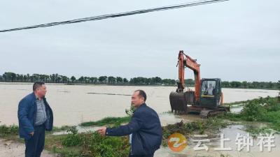 九里回族乡边畈村网格站全力排涝保“粮袋”