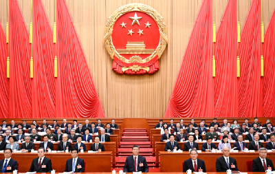 十四届全国人大三次会议在京开幕 习近平等在主席台就座