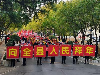 沙洋：民俗“踩街”闹元宵