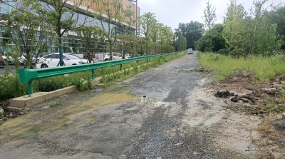 长林社区快速处置路面积水 解民出行之忧