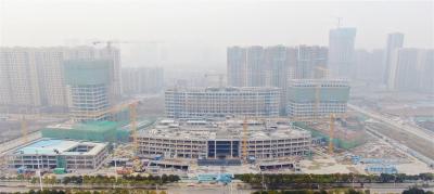 千人施工“大会战” 首个重大疫情救治基地冲刺年底完工
