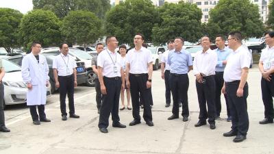 覃业成调研“四个重大”领衔事项推进落实情况