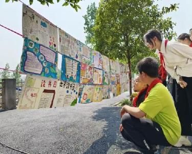 城关镇临沮小学开展“世界读书日”读书分享暨手抄报展览活动