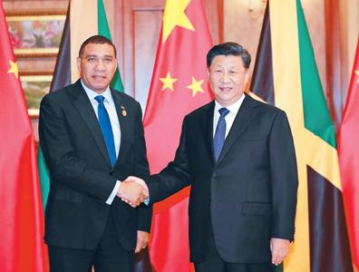 习近平会见牙买加总理霍尔尼斯