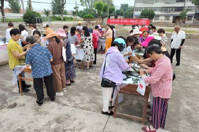 【精神文明创建活动宣传阐释·文明实践】窑湾社区新时代文明实践站线上线下同步开展“端午传爱心，粽情暖社区”文化活动