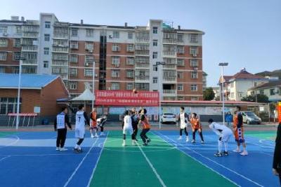 新民村开展篮球友谊赛