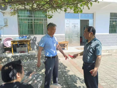 石头咀镇教育总支开展“七一”走访慰问老党员活动