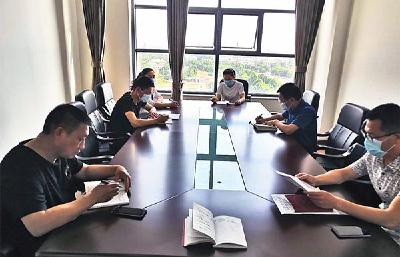 市残联党员干部热议全国两会