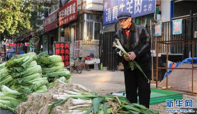 沈阳：菜市场用壁画诉说百余年烟火气