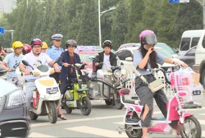 电动自行车“安全帽”真戴上了吗？