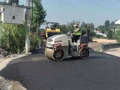 南桐线道路改建工程完成沥青铺筑