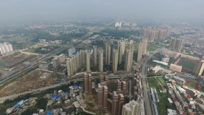燕加隆河西产业园：国内外建设者项目一线过春节