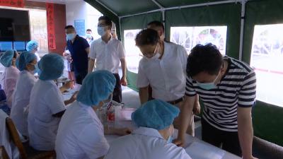 视频丨代表委员核酸检测   全面防控开好“两会” 