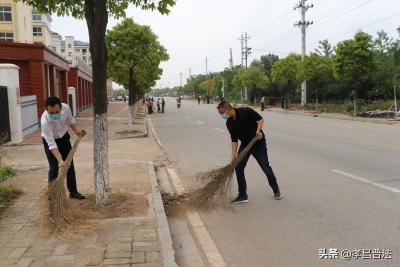 孝昌县司法局：组织干部走乡村  清洁村庄助振兴