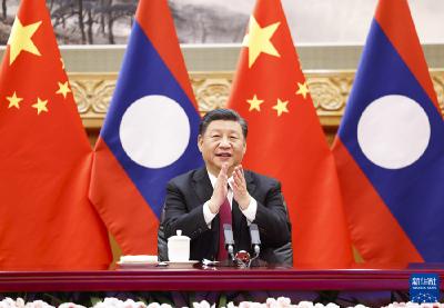 习近平同老挝人民革命党中央总书记、国家主席通伦共同出席中老铁路通车仪式