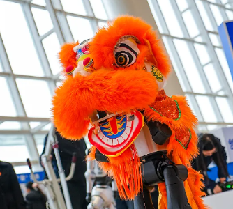 鄂州“新春第一会”科技感爆棚！“赛博舞狮”与机器狗握手点亮会场