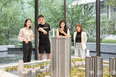 大雨浇不熄购房热情 楼市“火六月”有望接棒“红五月”