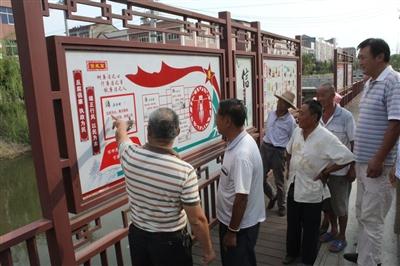 潘家湾镇扎实开展“十进十建”进社区活动 