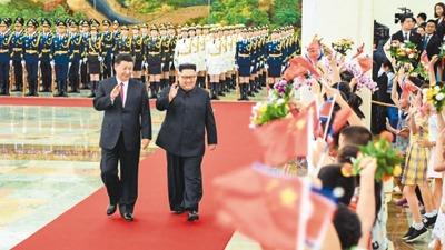 习近平同朝鲜劳动党委员长金正恩举行会谈