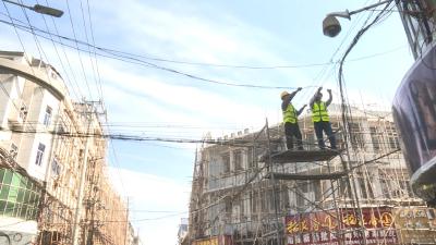 消除“空中蜘蛛网” 加速推进弱电线路入地