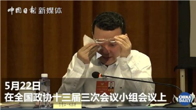 谈到基层抗疫干部时，住鄂全国政协委员尔肯江·吐拉洪几度哽咽