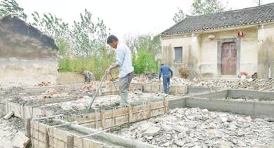 灾后重建看垌塚
