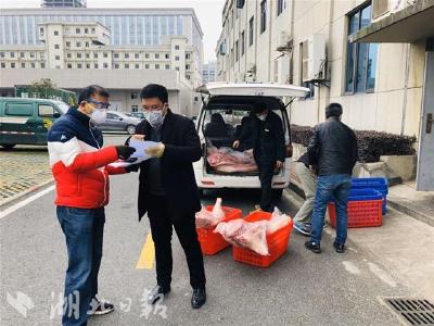 严格封闭管理后居民生活如何保障？记者探访武汉社区团购配送