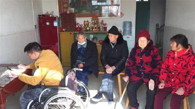 轮椅上蹚出脱贫路