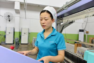 纺织女工王婷的“倔强”