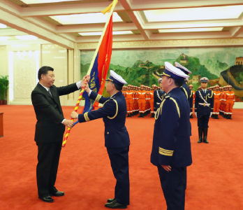 授旗寓意深 训词千钧重 习近平为这支队伍举旗定向