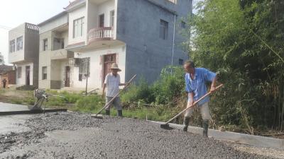 【垌塚】硬化补修 窄路加宽 这条乡村公路大变样