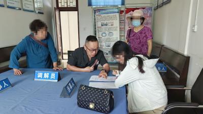 狗伤路人怎么赔？看法官诉前调解止纷争