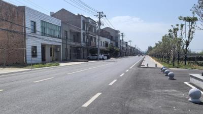 庙头：道路刷黑解民忧 铺就乡村幸福路