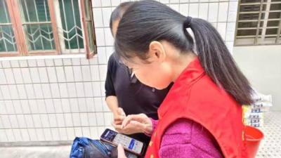 仙人位社区：“三进”服务暖人心 “两保”代办代缴送到家