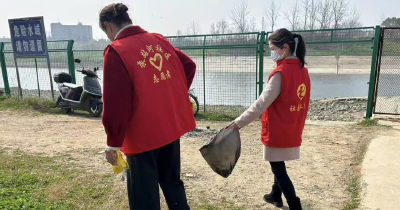 志愿红点亮泵站河 雷锋精神润社区