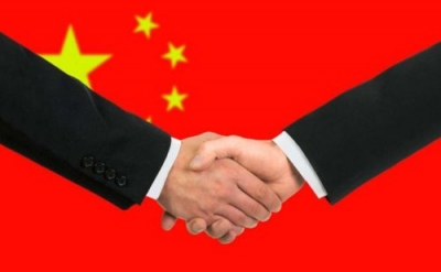 习近平同伊拉克总统马苏姆就中伊建交60周年互致贺电