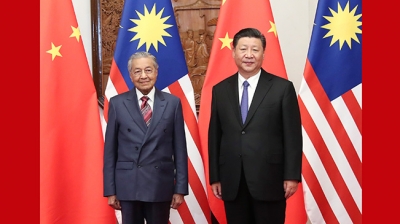 习近平会见马来西亚总理马哈蒂尔
