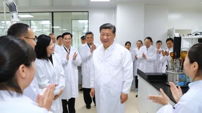 习近平：高举新时代改革开放旗帜 把改革开放不断推向深入